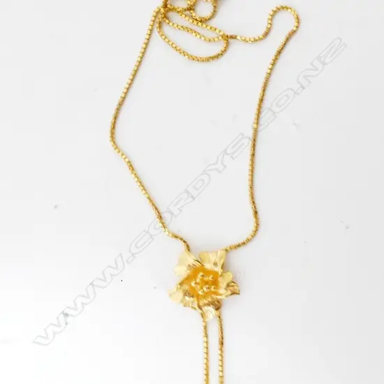 A 21ct. gold chain and pendant