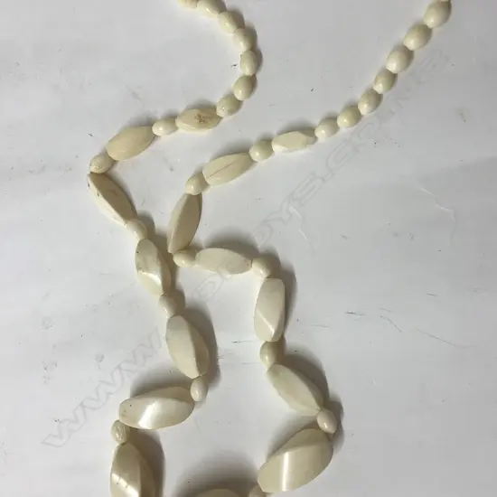 A vintage ivory bead necklace