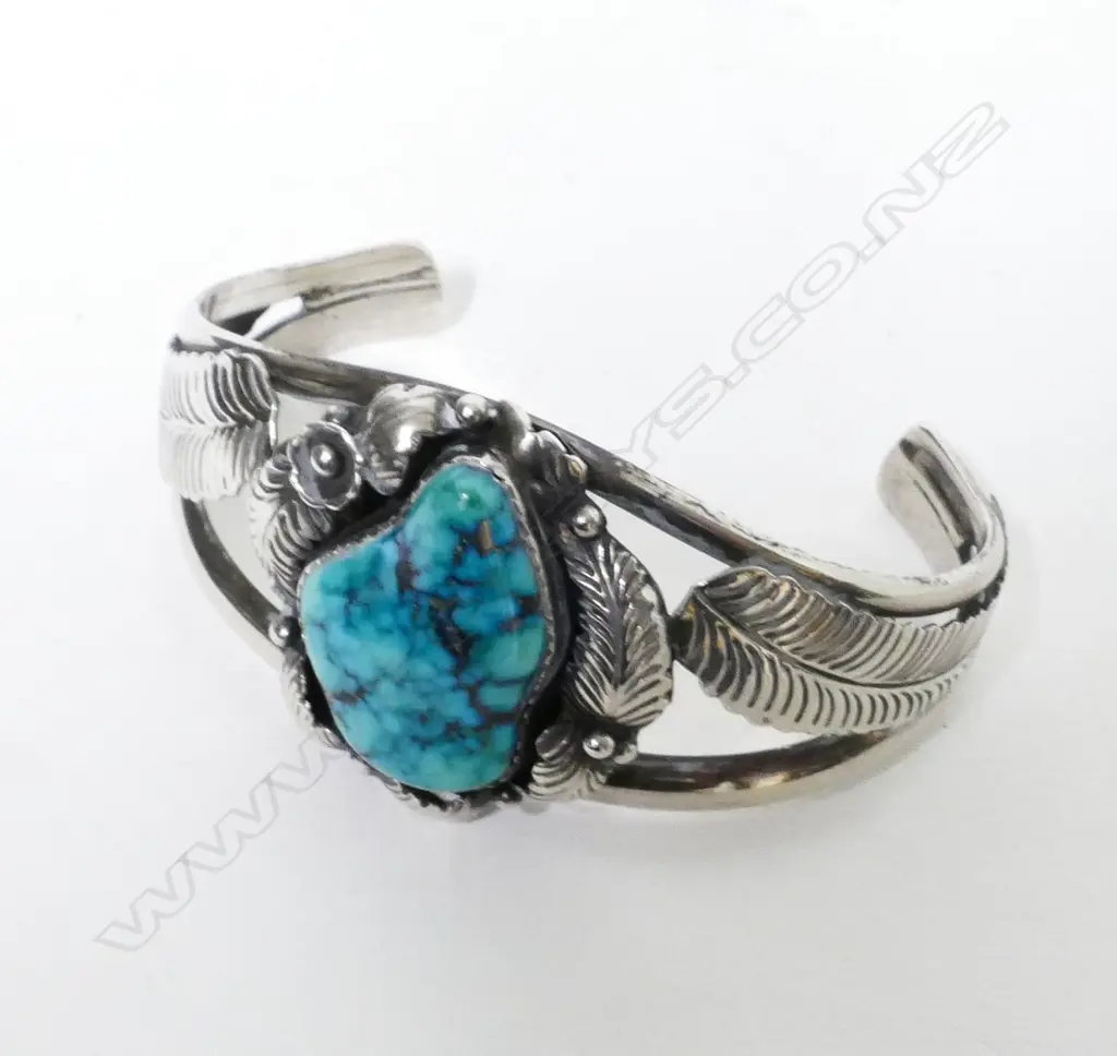 A Navajo silver and turquoise cuff Image 1++