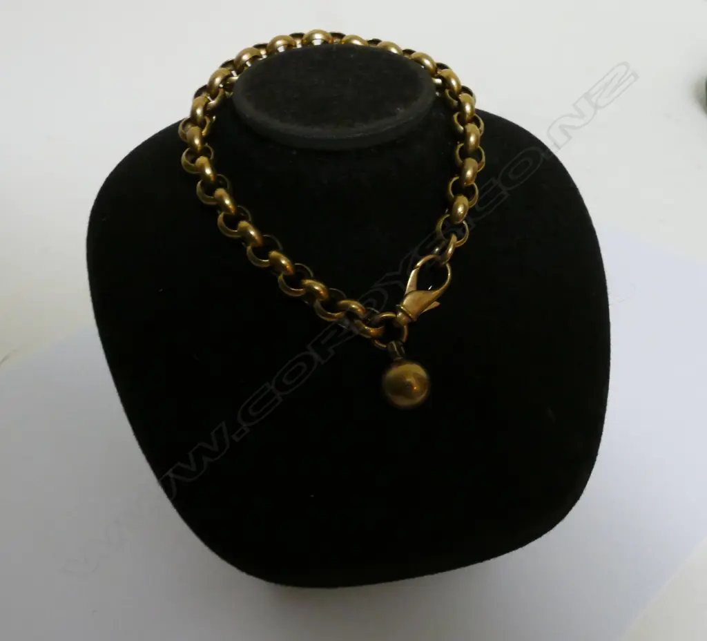 A 9ct. gold charm gold charm bracelet Image 1++