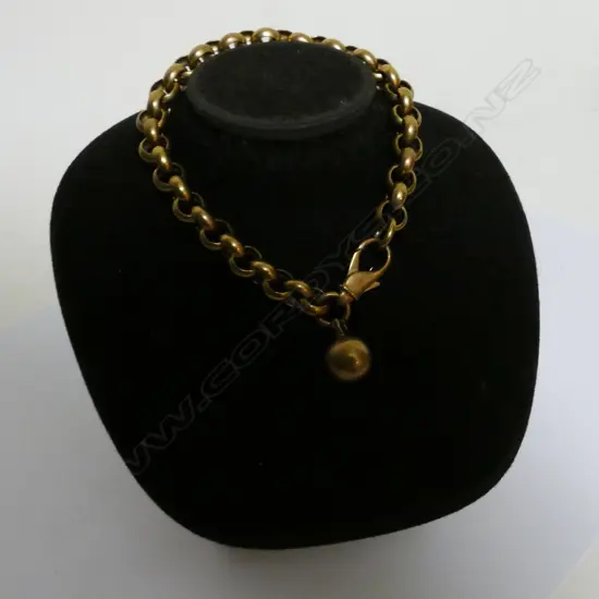 A 9ct. gold charm gold charm bracelet