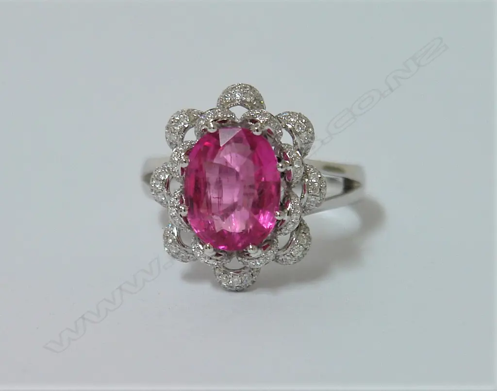 A lady's 18ct. white gold rubellite and diamond dress ring Image 1++