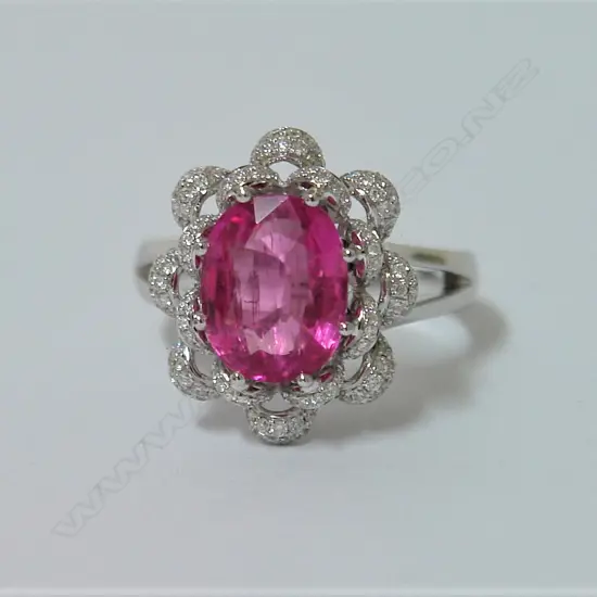 A lady's 18ct. white gold rubellite and diamond dress ring