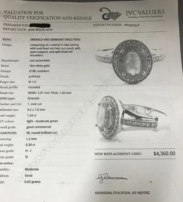 An 18ct. white gold emerald and diamond ring Image 1++