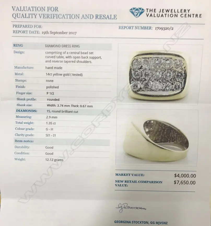 A gent's 14ct gold and diamond ring Image 1++