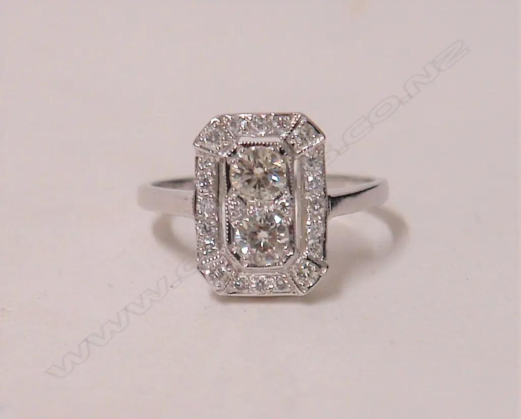 A lady's 18ct. white gold Art Deco style diamond cluster ring Image 1++