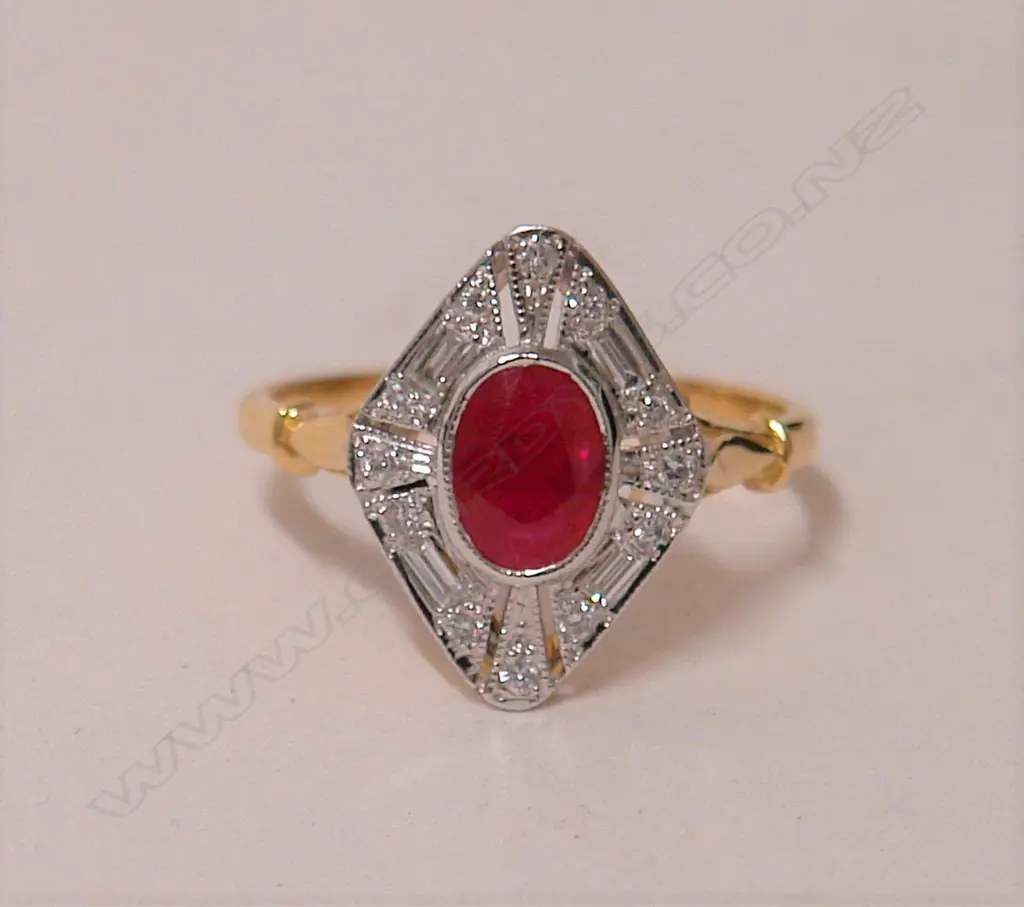 An 18ct. Art Deco style lady's ruby and diamond cluster ring Image 1++
