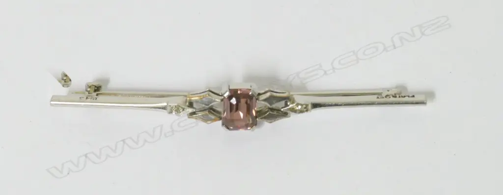 An Art Deco platinum and 9ct. white gold bar brooch Image 1++