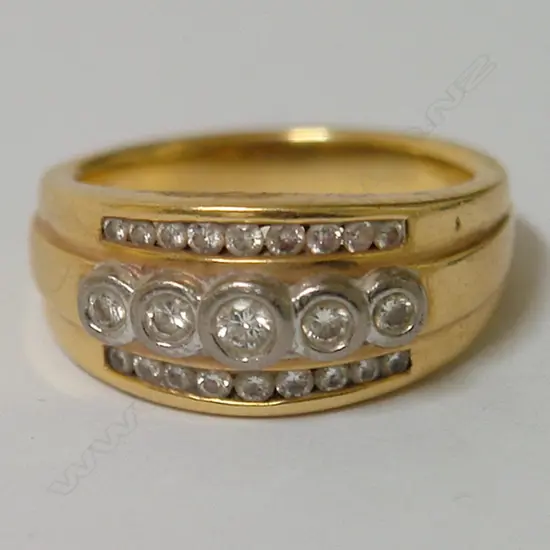 A heavy vintage 18ct. yellow gold and diamond dress ring