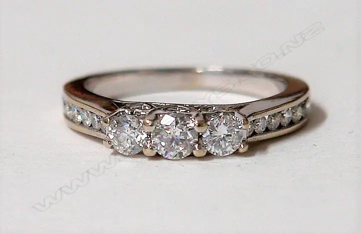 A 10ct. white gold modern lady's diamond ring Image 1++
