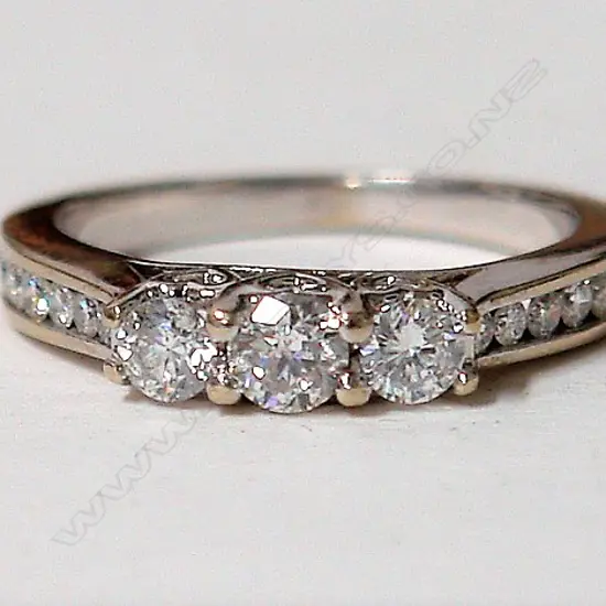 A 10ct. white gold modern lady's diamond ring