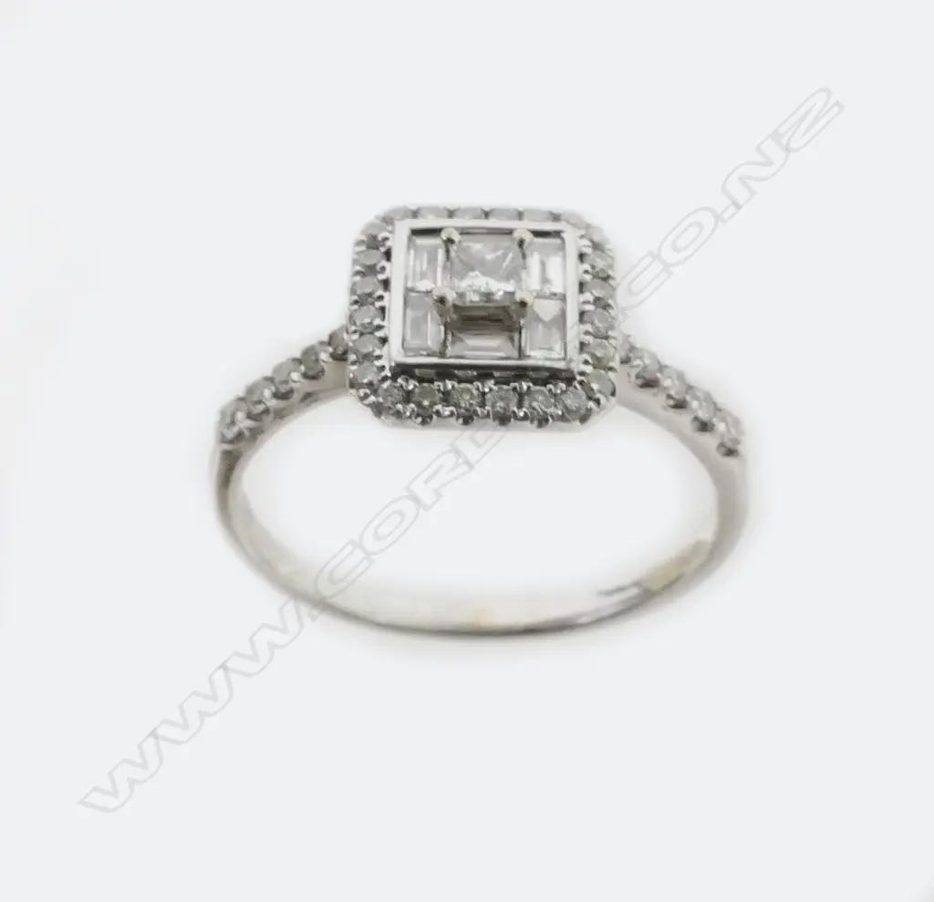 An 18ct. white gold and diamond ring Image 1++