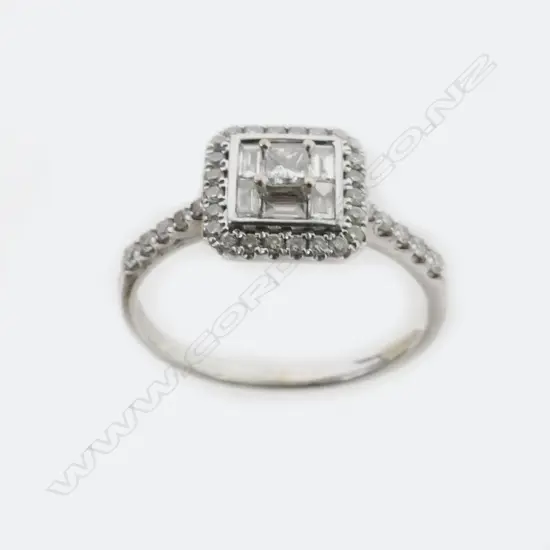 An 18ct. white gold and diamond ring