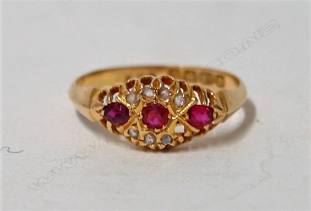 A vintage 18ct. yellow gold natural ruby and diamond lady's ring Image 1++