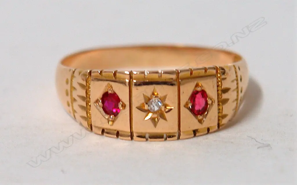 An early 20thC 18ct. yellow gold ruby and diamond ring Image 1++