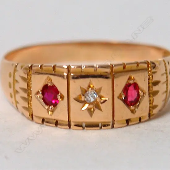 An early 20thC 18ct. yellow gold ruby and diamond ring
