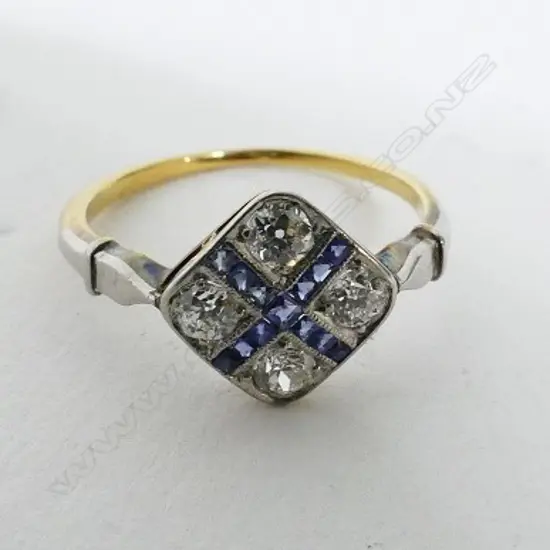 An Art Deco 18ct. gold and platinum diamond and sapphire ring