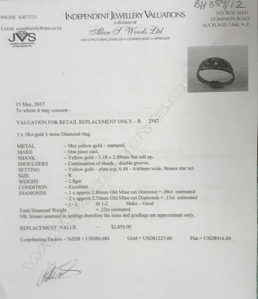 An 18ct. yellow gold and three stone diamond ring Image 1++