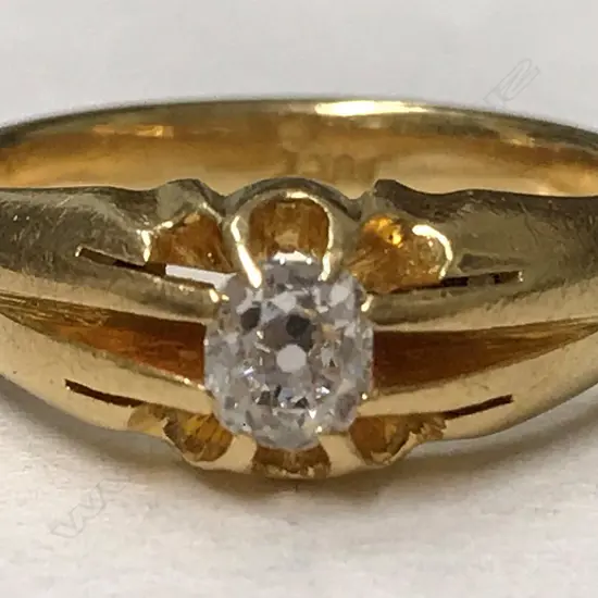 An 18ct. yellow gold and diamond ring