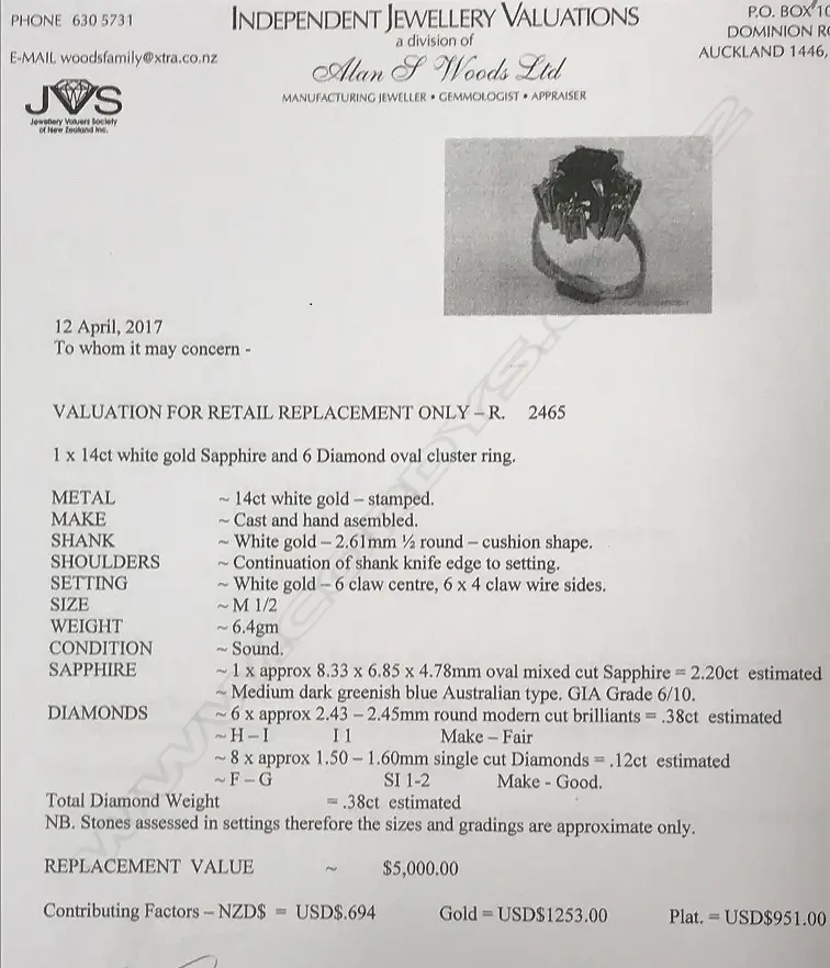 A 14ct. white gold sapphire and diamond ring Image 1++