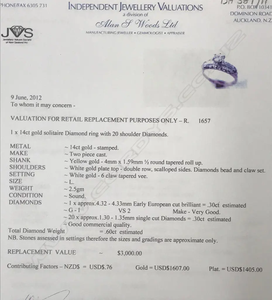 A 14ct. gold and diamond ring Image 1++