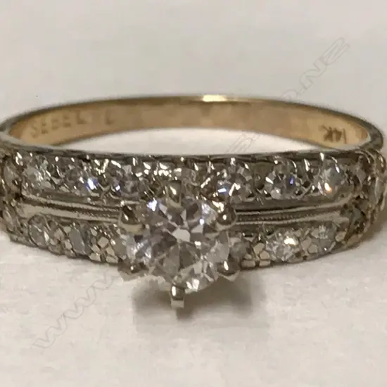 A 14ct. gold and diamond ring