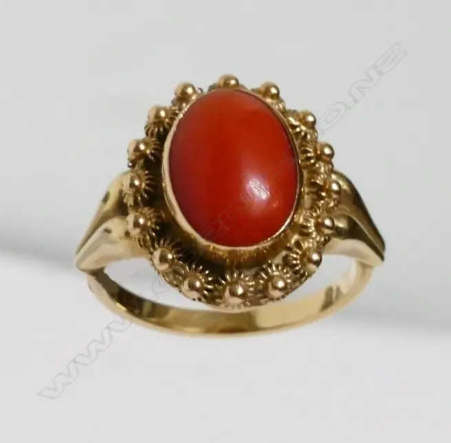 A 14ct. gold and coral ring Image 1++