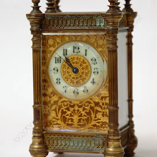 A late 19thC French fancy brass cased carriage clock