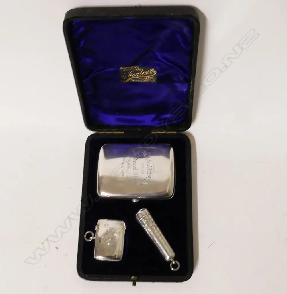 An Edwardian cased three piece silver smoker's suite Image 1++