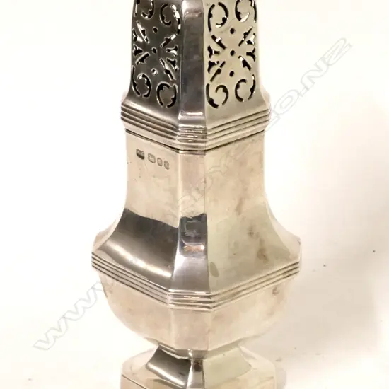 A silver sugar caster