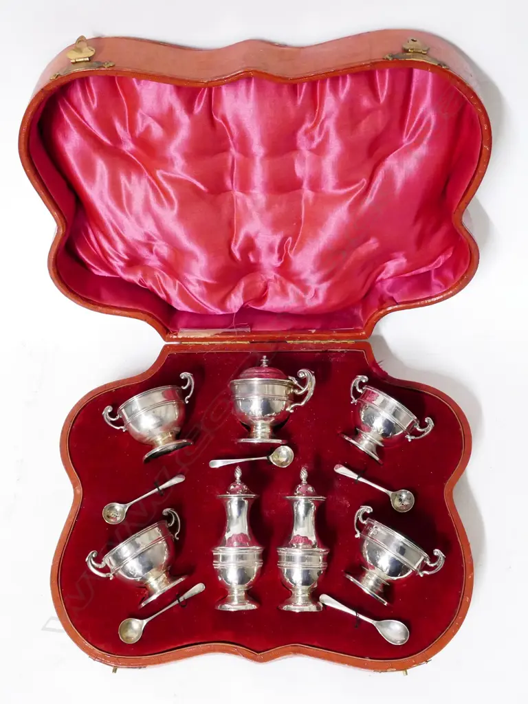 A seven piece Edwardian silver condiment set Image 1++
