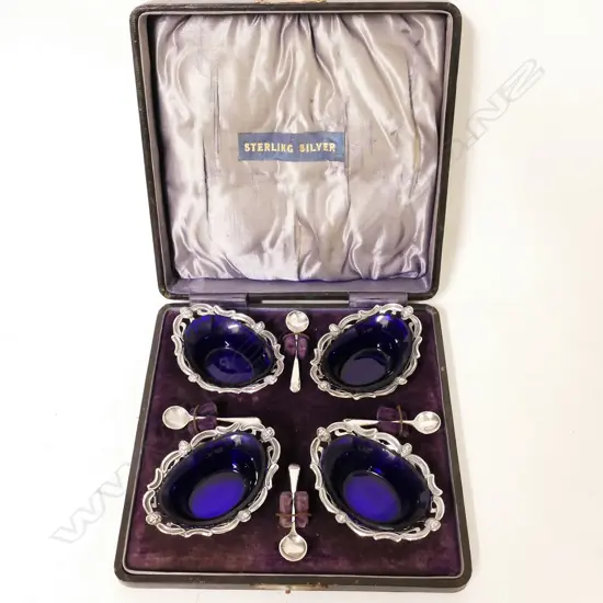 A cased set of four Edwardian silver salts