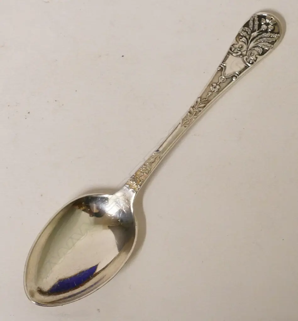 A walnut cased set of 12 silver teaspoons and a pair of sugar tongs Image 1++