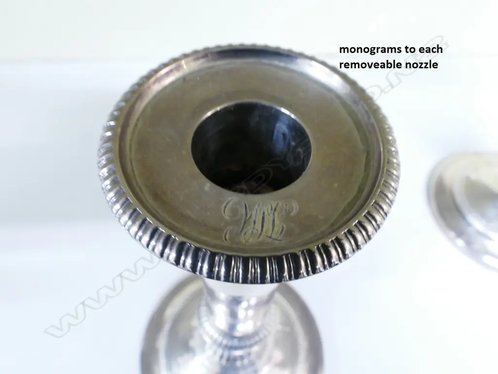 A pair of George III silver candlesticks Image 1++