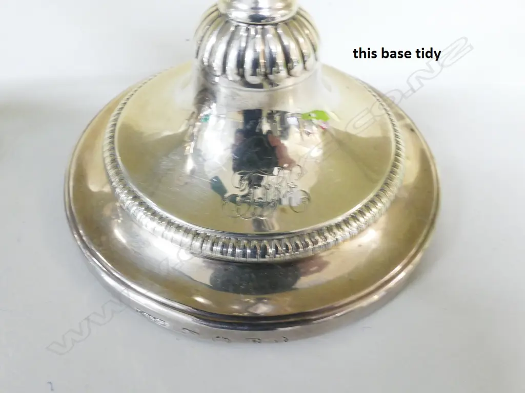 A pair of George III silver candlesticks Image 1++