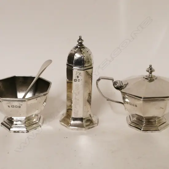 A silver three-piece cruet set
