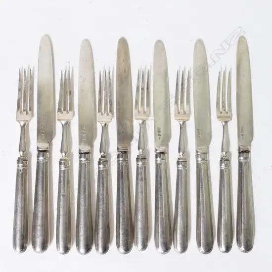 A set of six George III silver fruit knives and forks