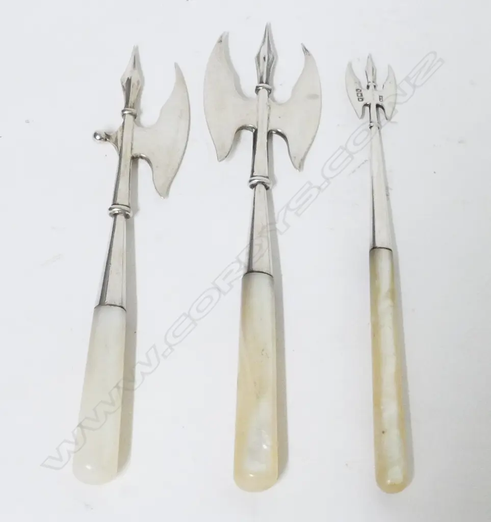 Three Edwardian silver and mother of pearl pickle forks Image 1++
