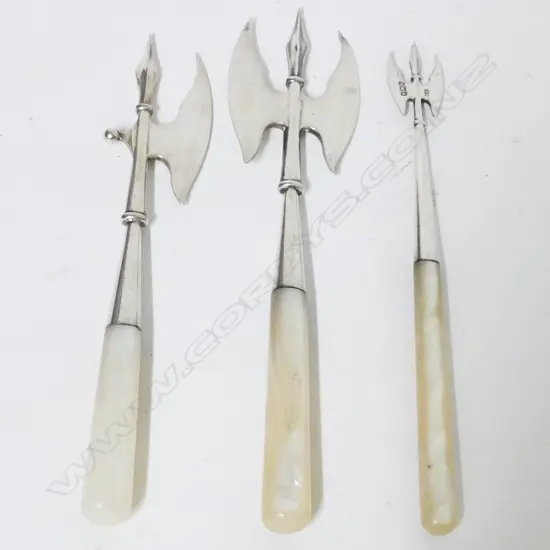 Three Edwardian silver and mother of pearl pickle forks