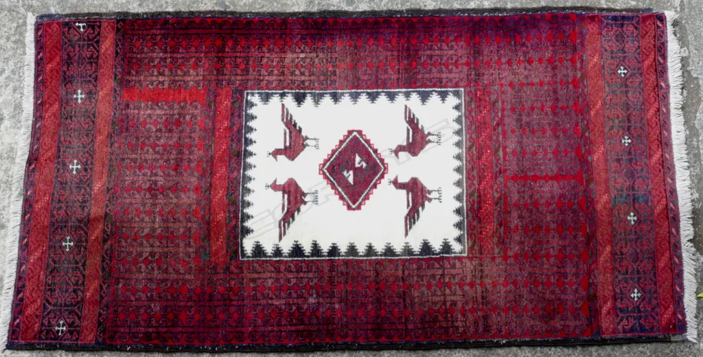 An Iranian Baluchi all wool rug Image 1++