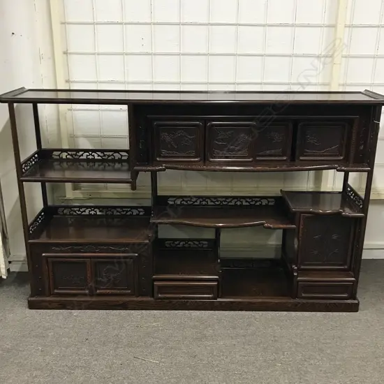 An Oriental figured rosewood display cabinet