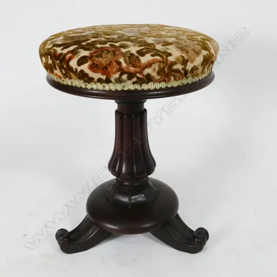 A William IV rosewood revolving piano stool