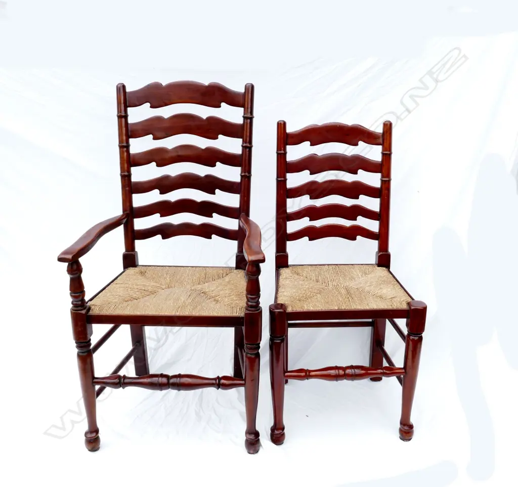 A set of ten walnut Lancashire ladderback country dining chairs (eight singles and two carvers) Image 1++