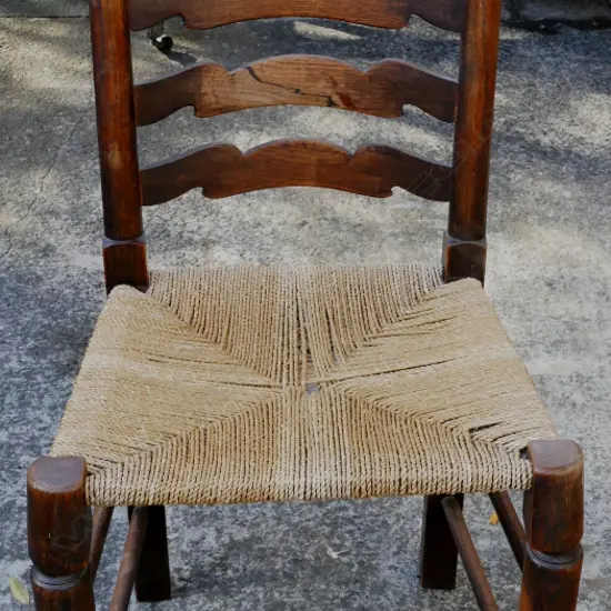 A set of six English oak ladderback country chairs