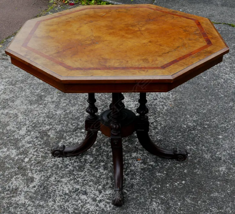 A Victorian burr walnut octagonal tilt-top supper table Image 1++