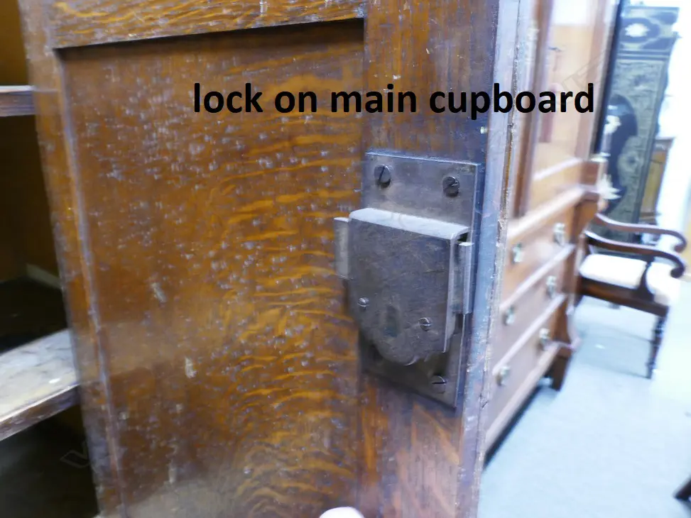 An impressive Georgian oak two-stage housekeeper's cupboard of plain country style Image 1++