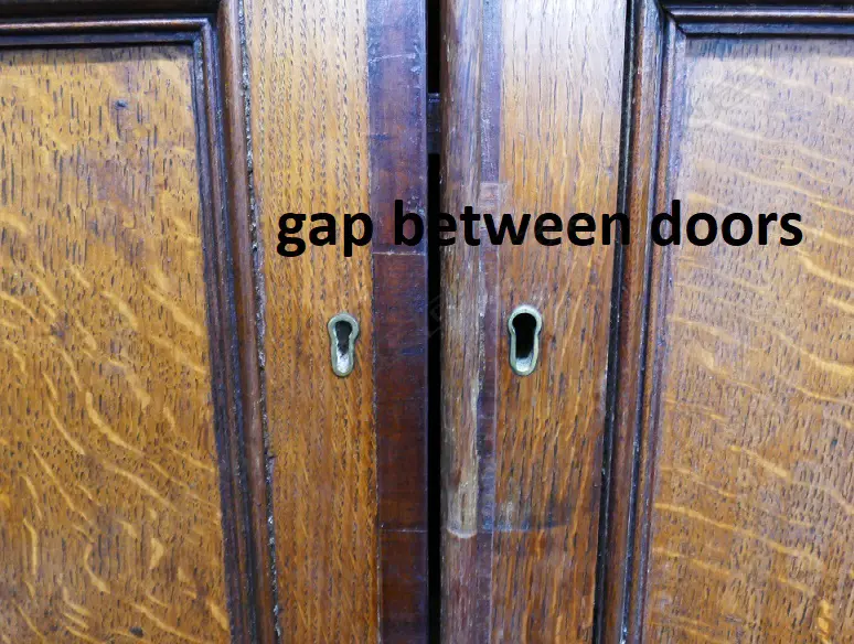 An impressive Georgian oak two-stage housekeeper's cupboard of plain country style Image 1++