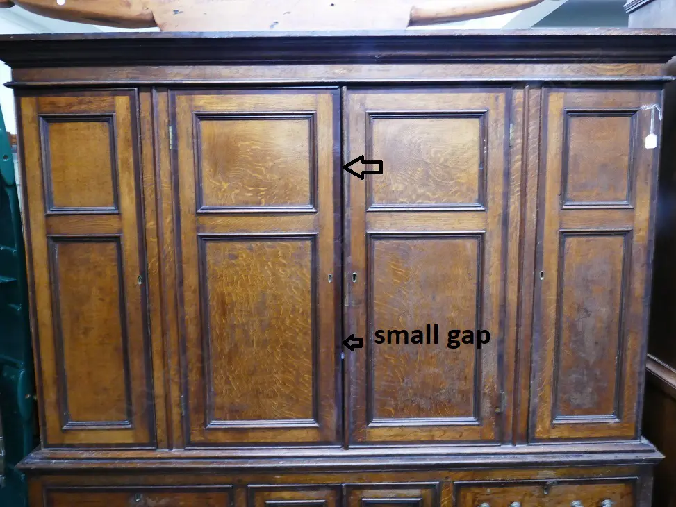 An impressive Georgian oak two-stage housekeeper's cupboard of plain country style Image 1++