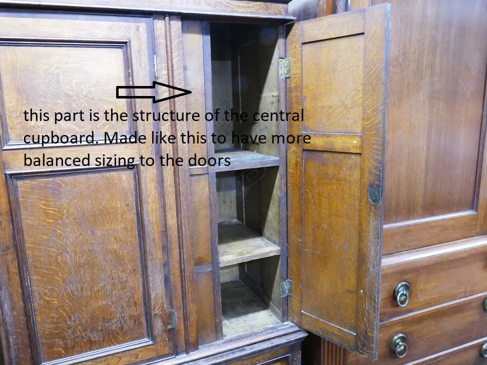 An impressive Georgian oak two-stage housekeeper's cupboard of plain country style Image 1++