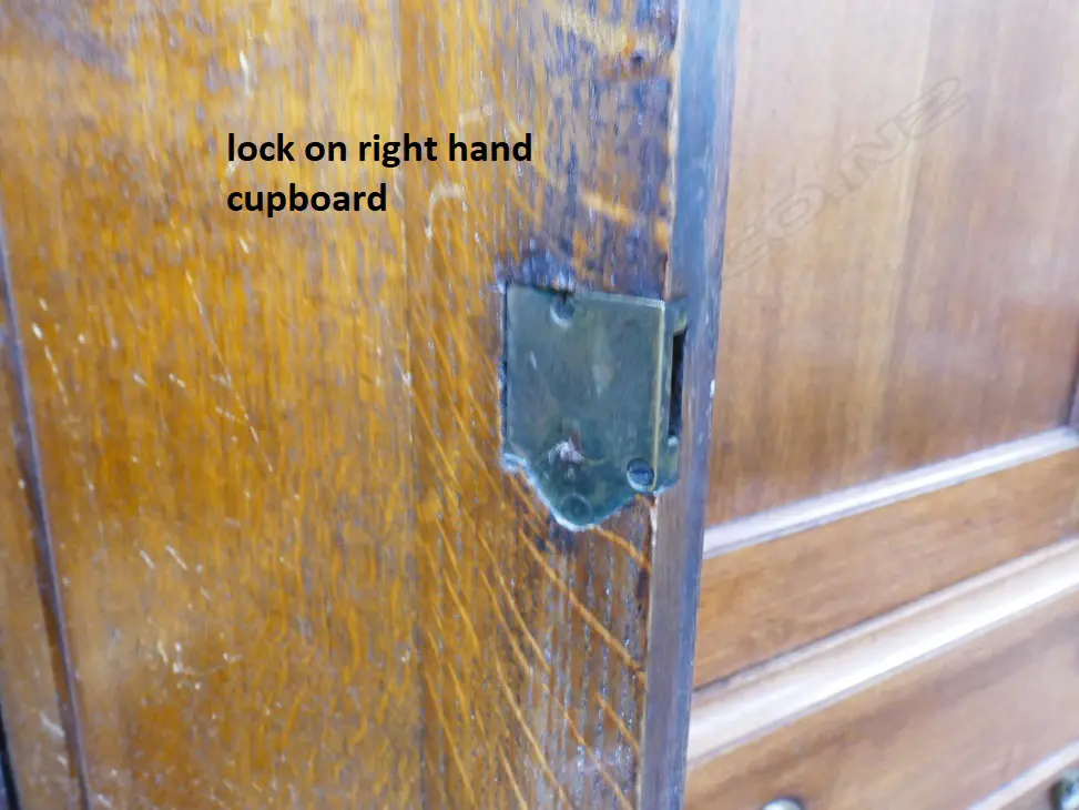 An impressive Georgian oak two-stage housekeeper's cupboard of plain country style Image 1++